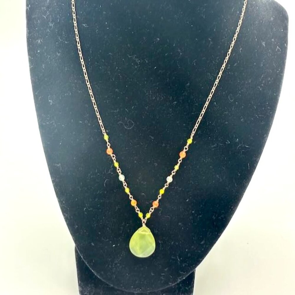 Delicate green pendant and orange bead and chain necklace